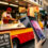 Food truck owner using handheld POS with built-in printer