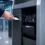 Automatic card collector installed inside self-service kiosk for visitor credential recovery